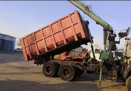 Вывоз строительного мусора с грейыером