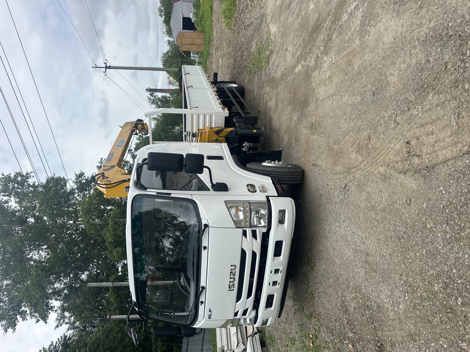 Бортовой манипулятор ISUZU ELF с КМУ 3 тонны