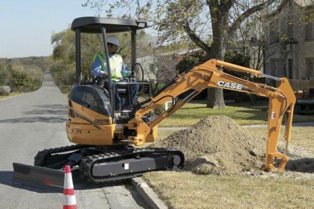 Услуги экскаватора Kubota для бурение скважин и рытья траншей