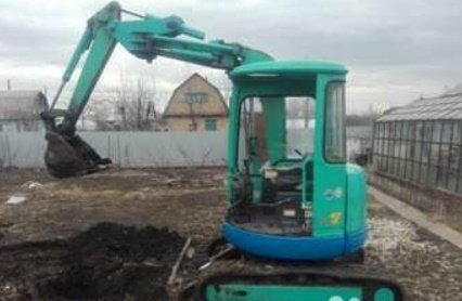 Копание участков под канализацию, траншеи