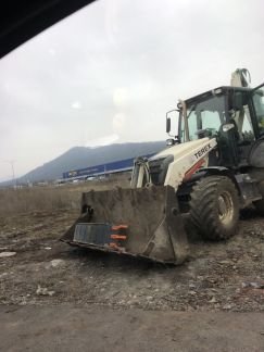 Аренда трактора, рытье котлованов, траншей