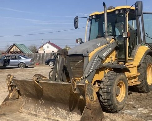 Услуги трактора с ковшом