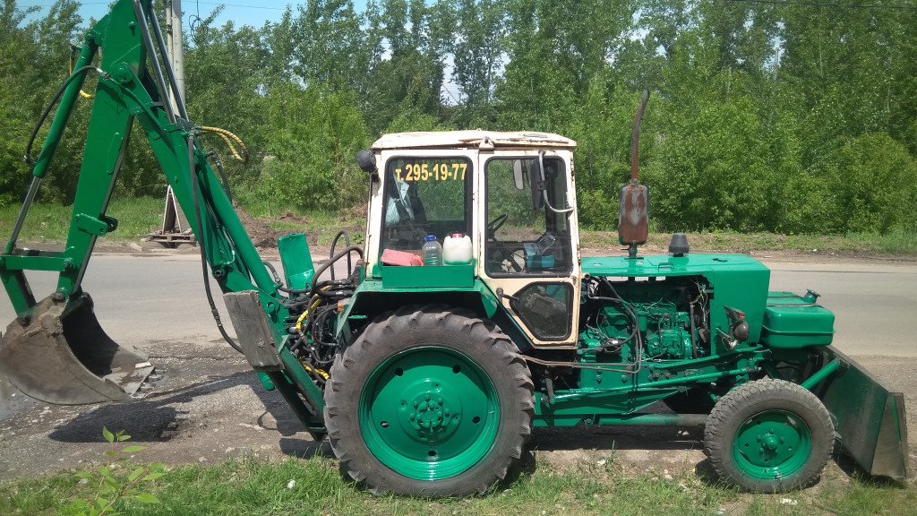 Услуги экскаватора бульдозера на базе трактора Бел