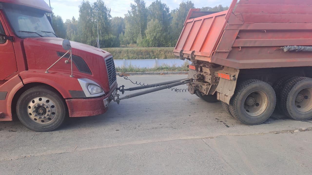 Грузовой эвакуатор буксировка на жёсткой сцепке 24