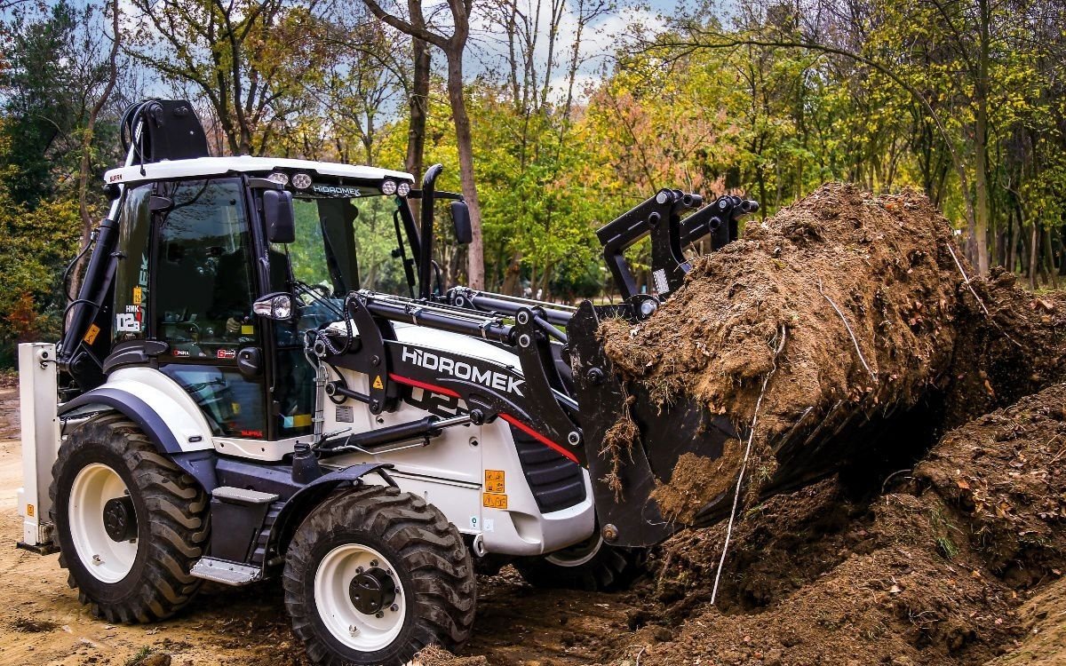 Услуги экскаватора погрузчика Hidromek
