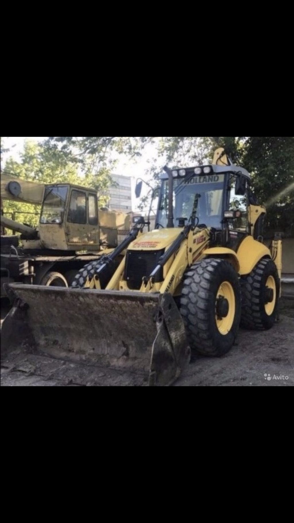 Аренда эскаватора-погрузчика New Holland b115b, гидромолот