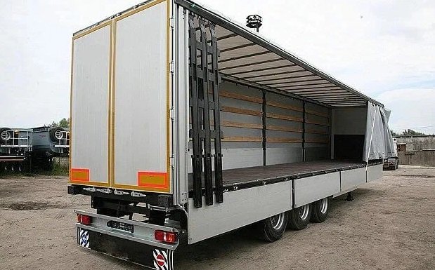Перевозки. Man 45 кубов с боковой погрузкой