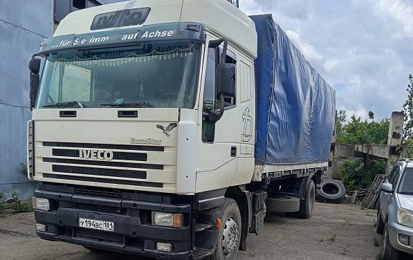 Грузовик Ивеко 7 метров с боковой, верхней загрузкой