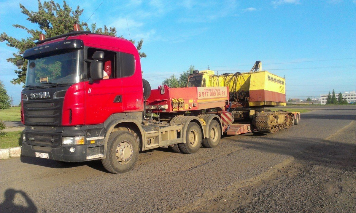 Услуги по перевозке техники, оборудования тралом Scania