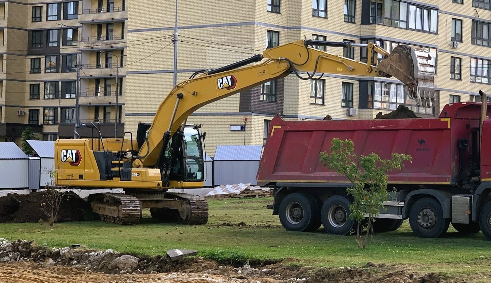 Аренда гусеничного Габаритного экскаватора CAT 320