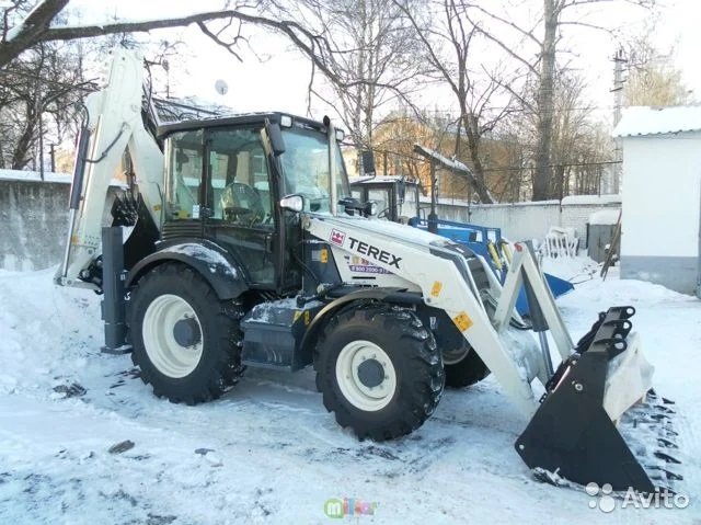 Копка траншей и планировка на CATERPILLAR с ковшами