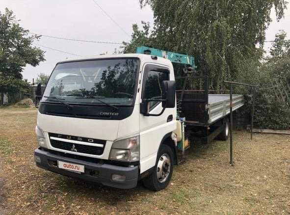 Услуги манипулятора. Бортовой с КМУ в аренду