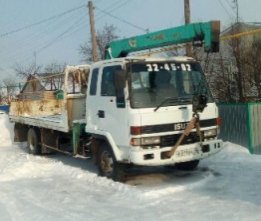 Автоэвакуатор-манипулятор Камаз Канглим, сдвижная платформа