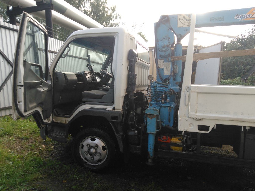 Аренда манипулятора Mitsubishi Canter по городу и области