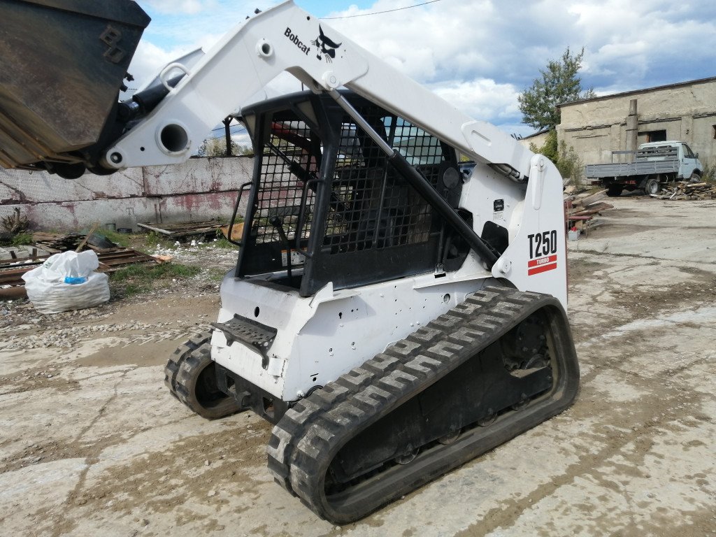 Мини-погрузчик BOBCAT услуги, аренда, заказ
