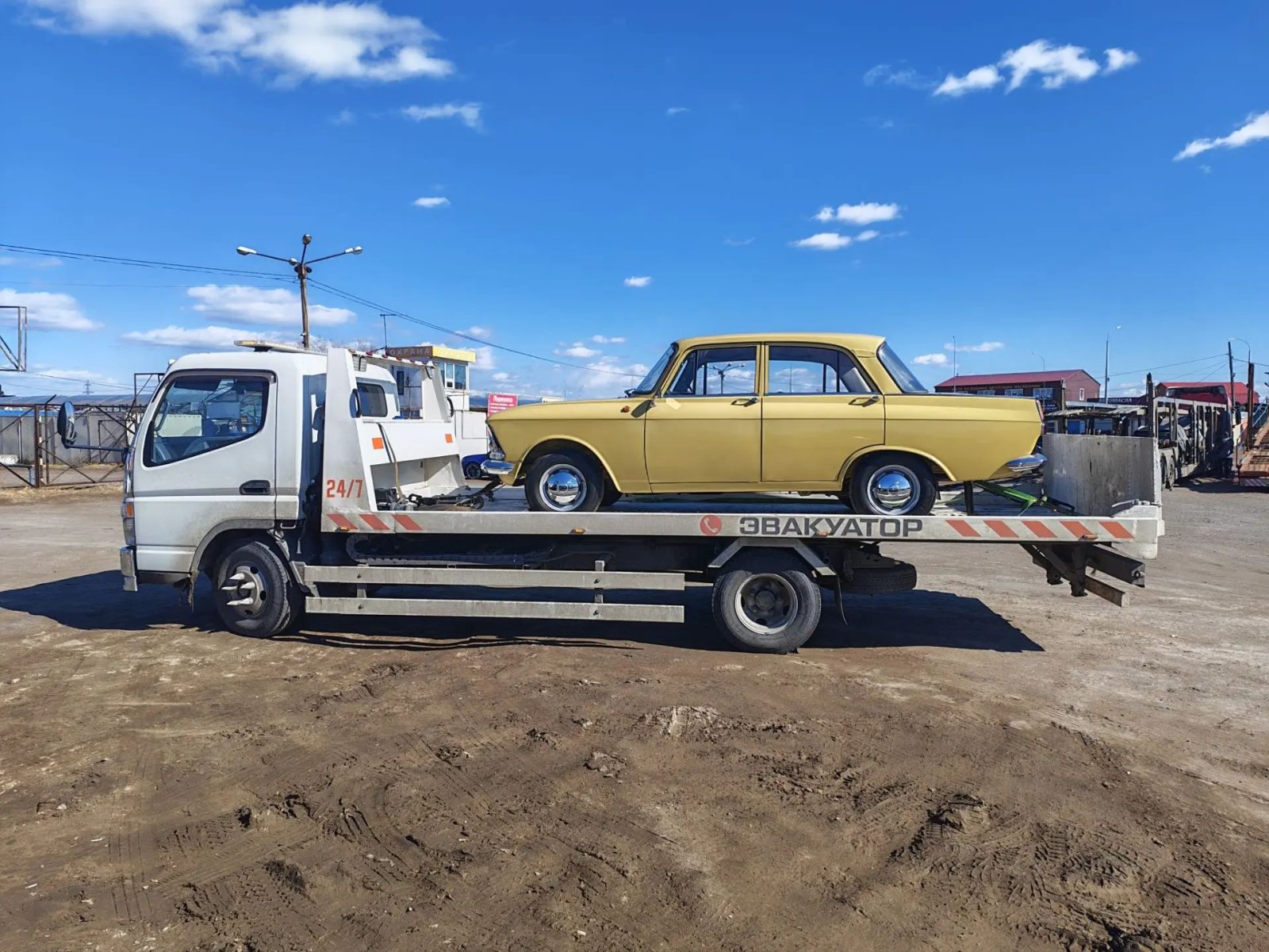 Эвакуатором Isuzu перевозка авто и техники до 3. 5 тонн