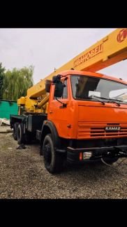 Кран МАЗ 32 тонны с телескопической стрелой 33 метра