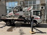 Аренда телескопической автовышки Исузу с поворотной люлькой