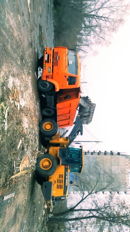 Услуги самосвала и фронтального погрузчика