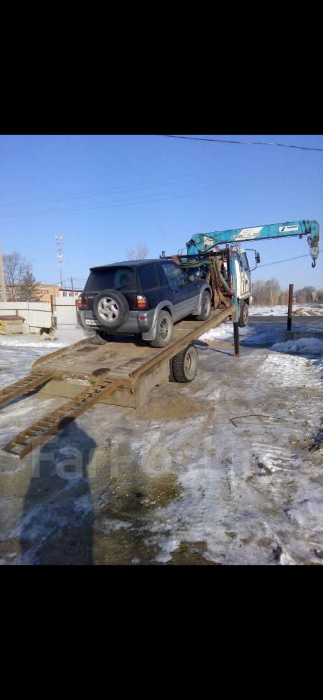 Эвакуатор с манипулятором, траверсой, лебедкой