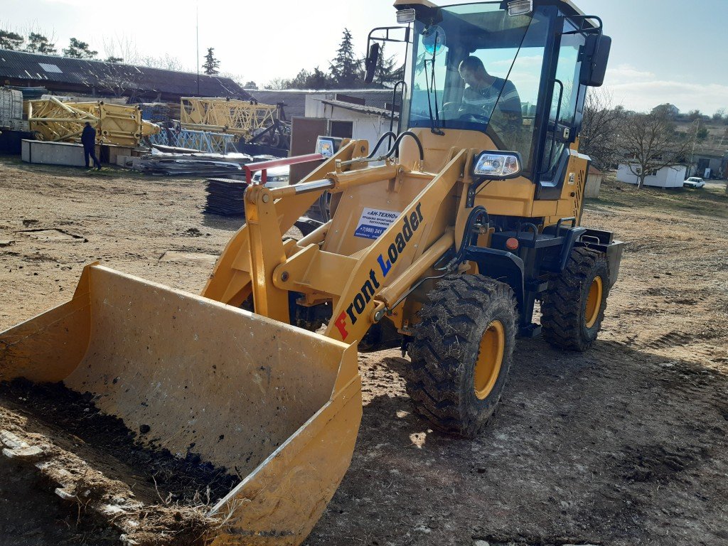 Фронтальный погрузчик в аренду, услуги