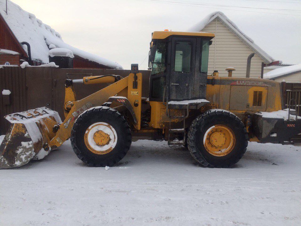 Услуги фронтального погрузчика LW300F