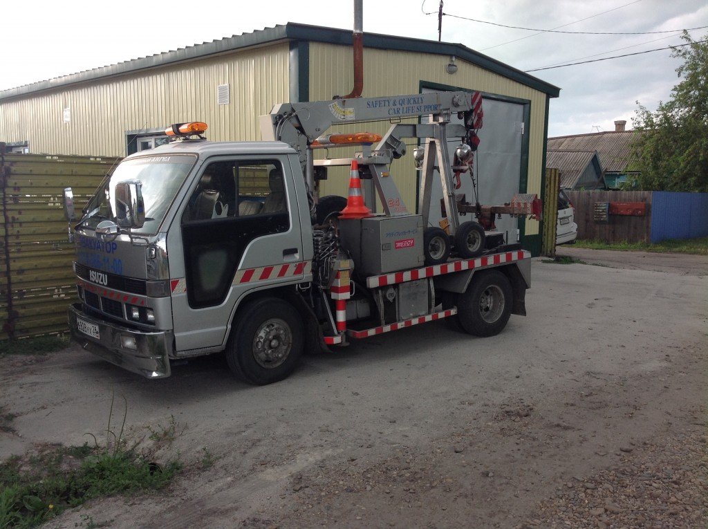 Эвакуатор Isuzu Elf, профессиональная эвакуация, от 1000₽