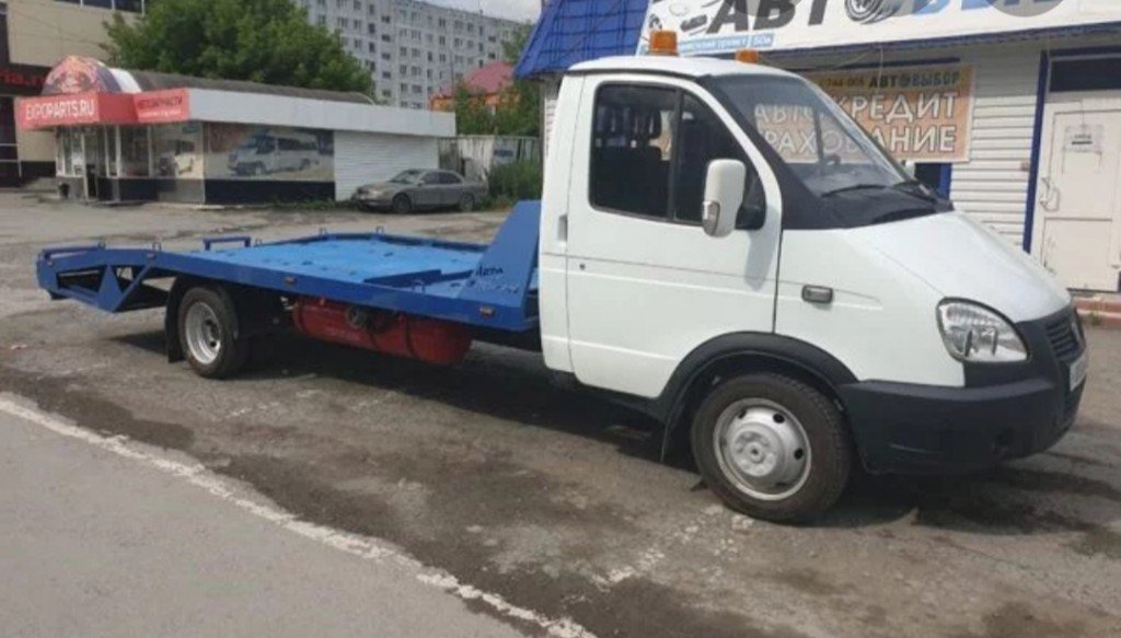 Услуги эвакуатора Большеречье