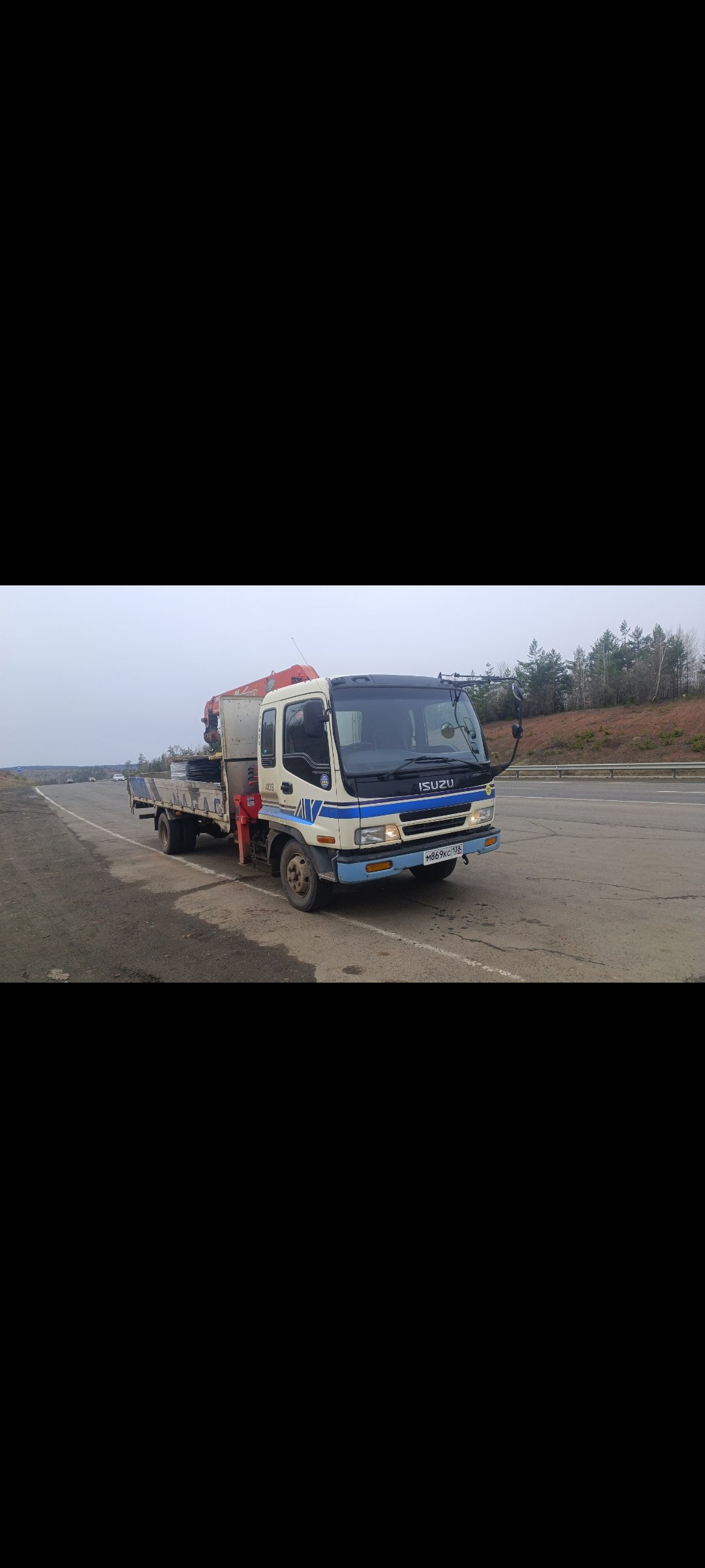 Услуги эвакуатора с манипулятором