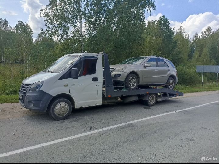 Эвакуатором Перевозка автомобилей и спецтехники