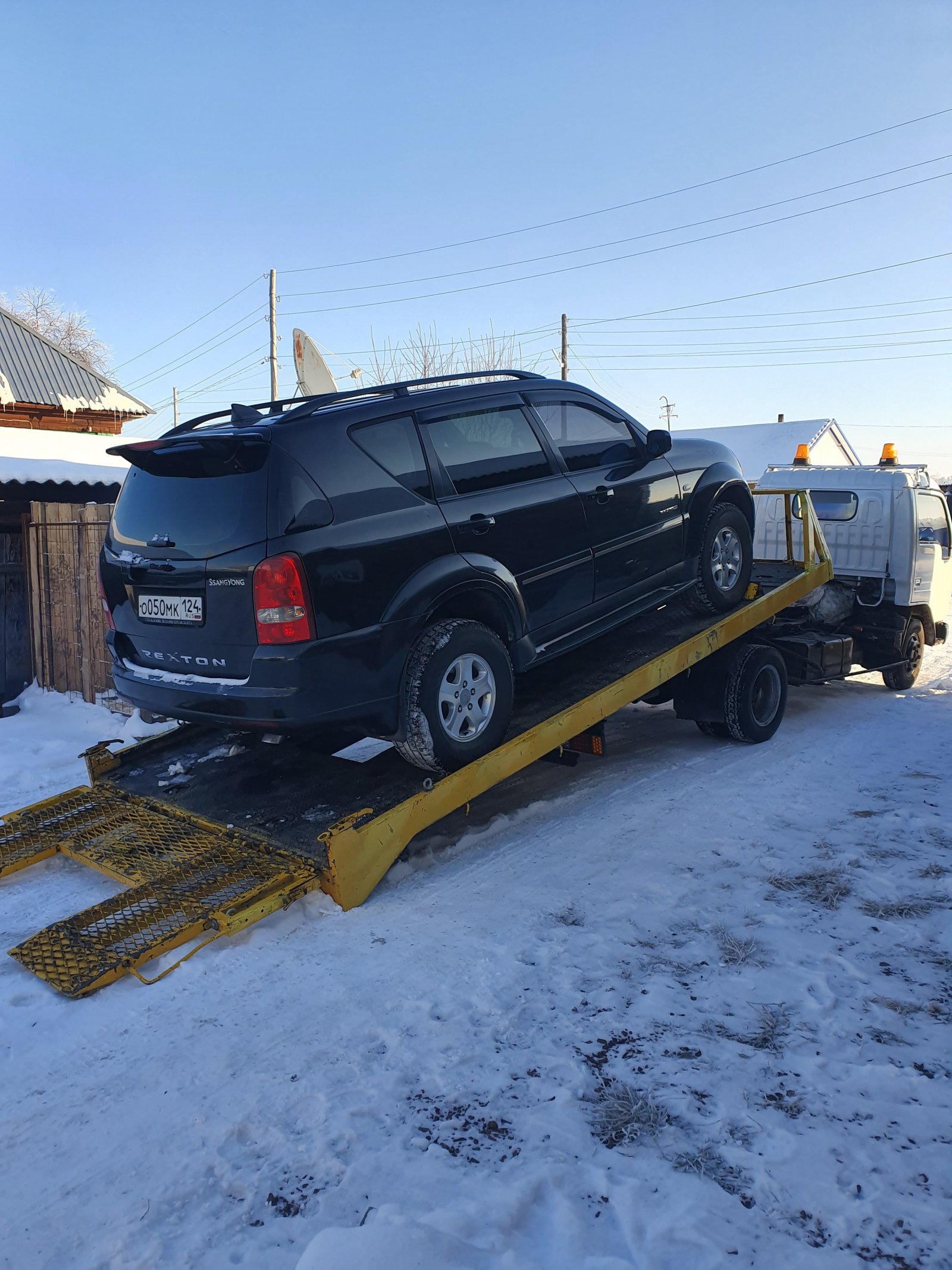 Услуга эвакуатора со сдвижной площадкой