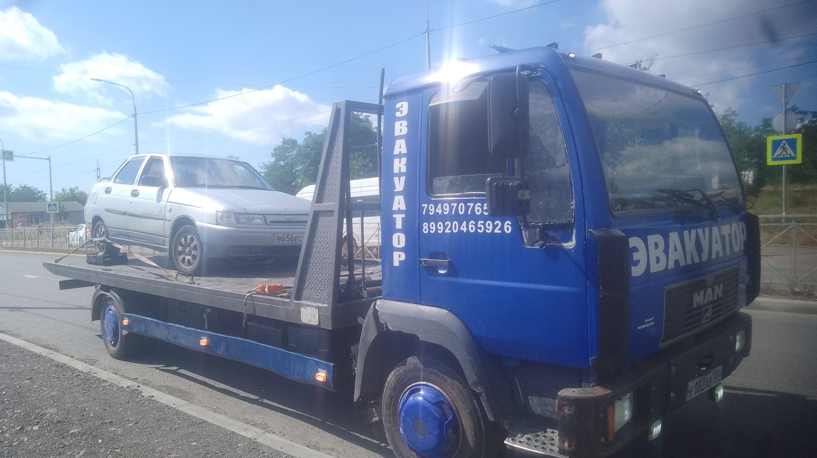 Перевозка до 5 тонн на открытой площадке эвакуатора МАН