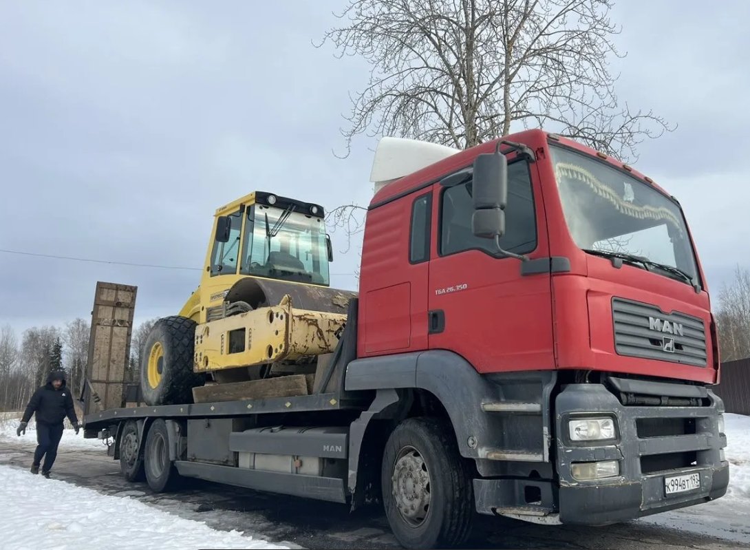 Грузовой эвакуатор Man TGA перевозка спецтехники
