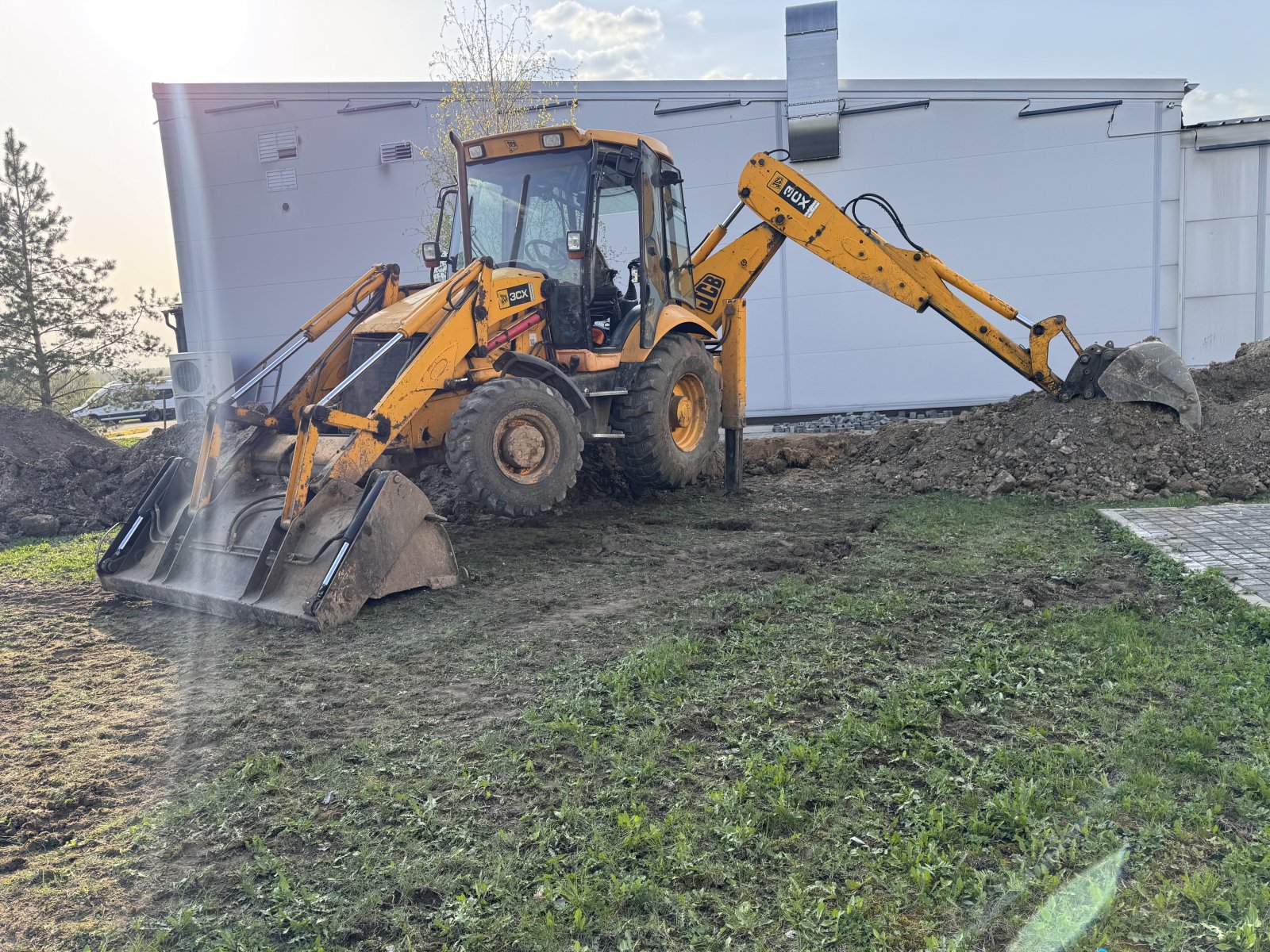 JCB 3СХ услуги экскаватора челюстного погрузчика