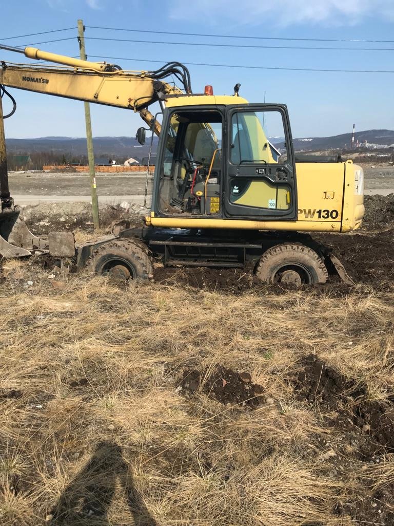 Аренда колесного полноповоротного экскаватора
