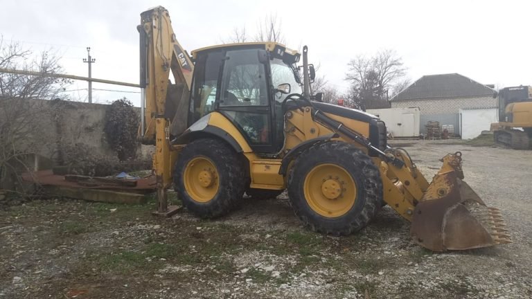 Экскаватор погрузчик CATERPILLAR 434