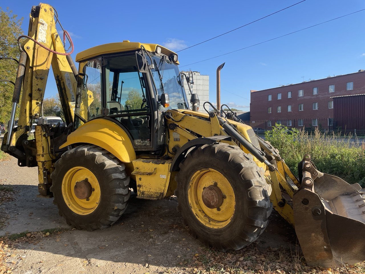 Аренда экскаватора-погрузчика New Holland LB115B-4PS
