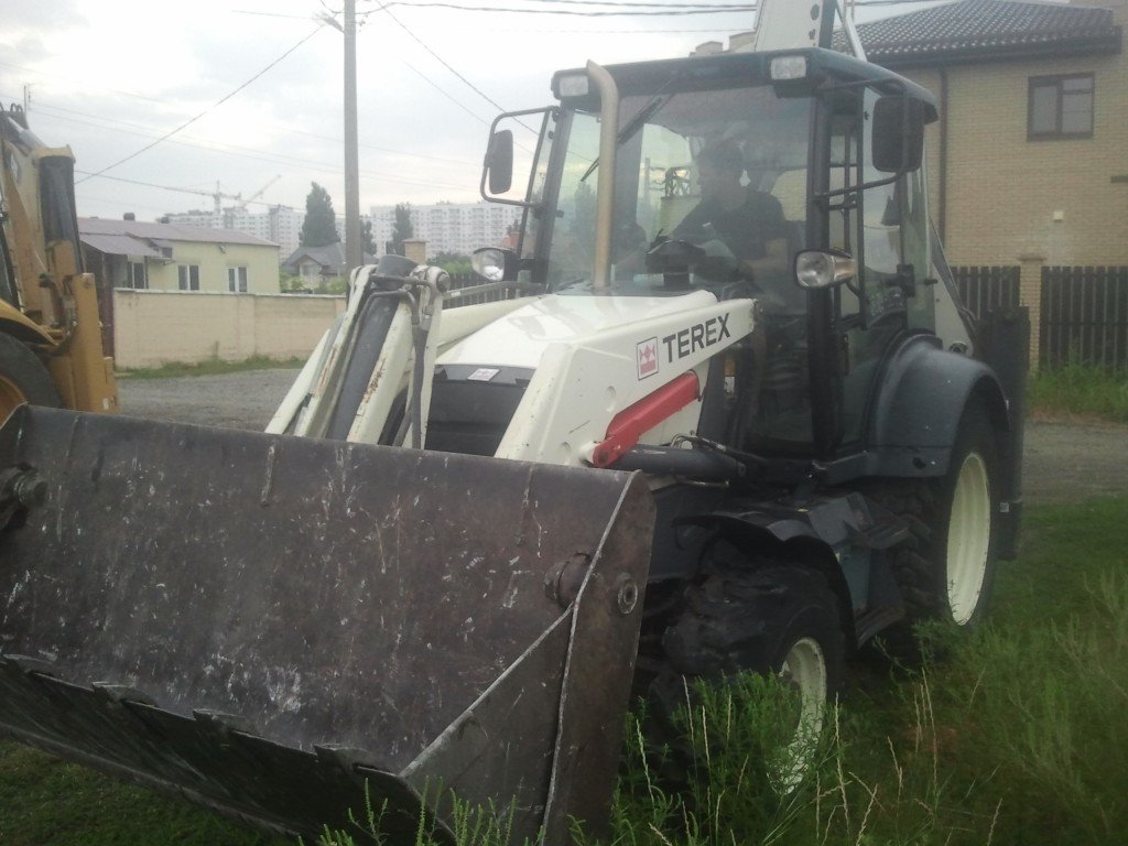 Аренда экскаватора погрузчика Terex 860