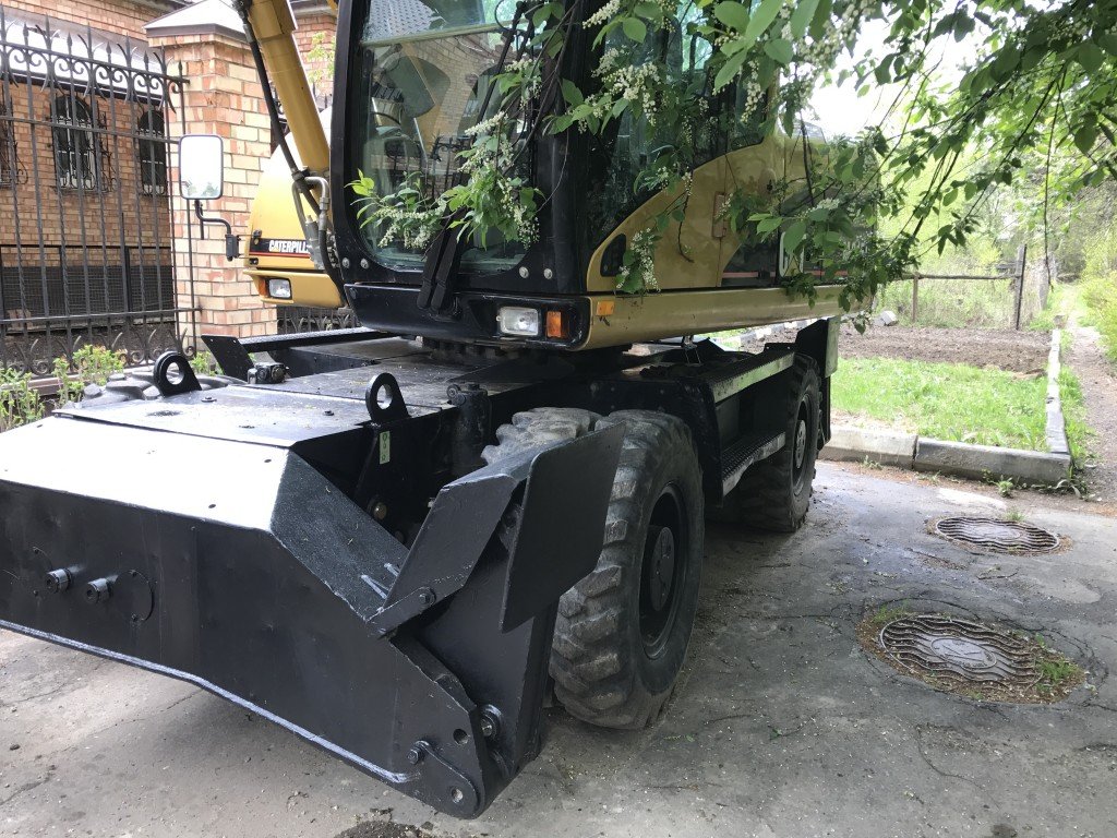 Аренда колессного экскаватора CATERPILLAR