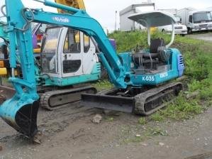 Экскаватор Kubota с ямобуром, с ковшом