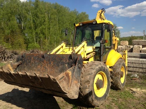 Аренда многофункционального экскаватора New Holland LB