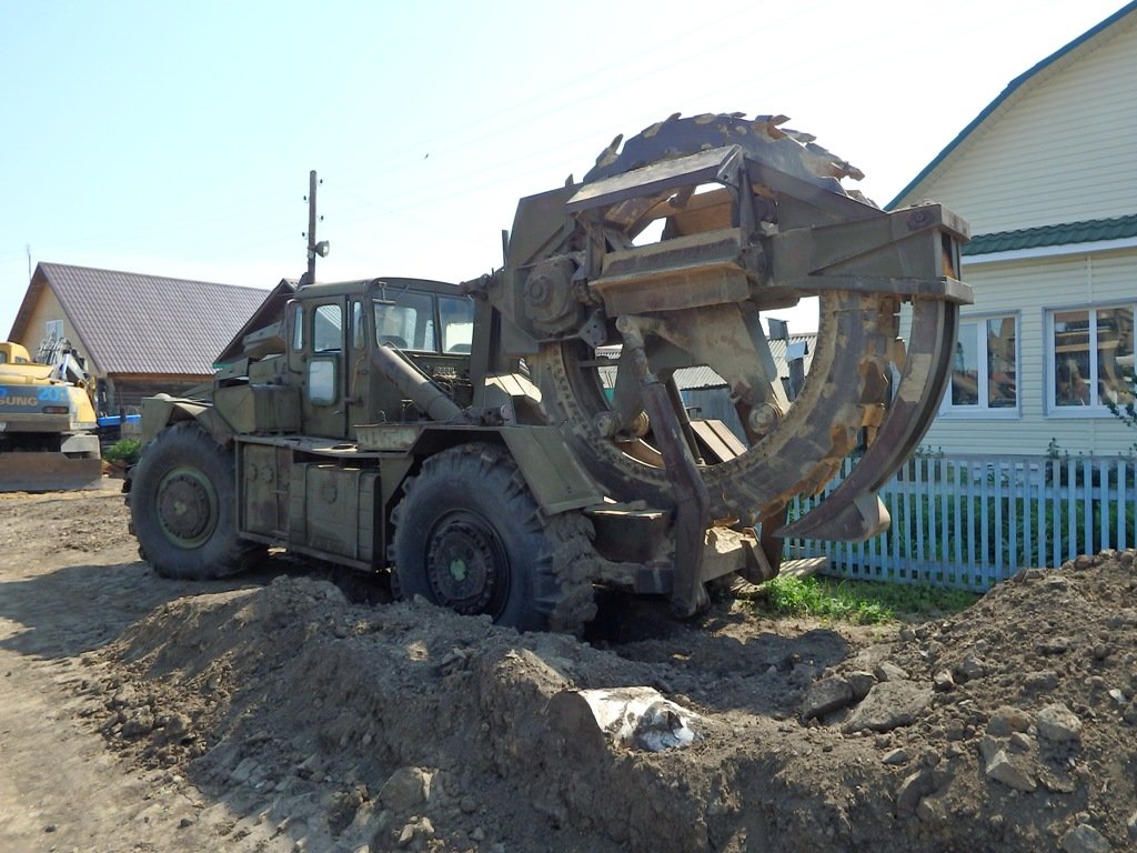 Экскаватор роторный траншеекопатель
