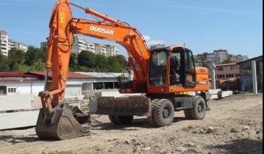 Аренда полноповоротного экскаватора с гидромолотом