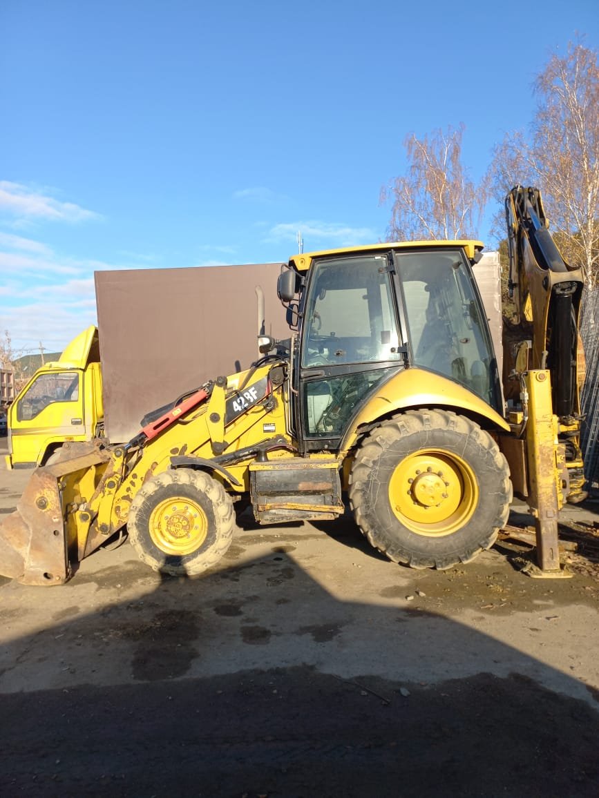 Аренда экскаватора- погрузчика Caterpillar 428f