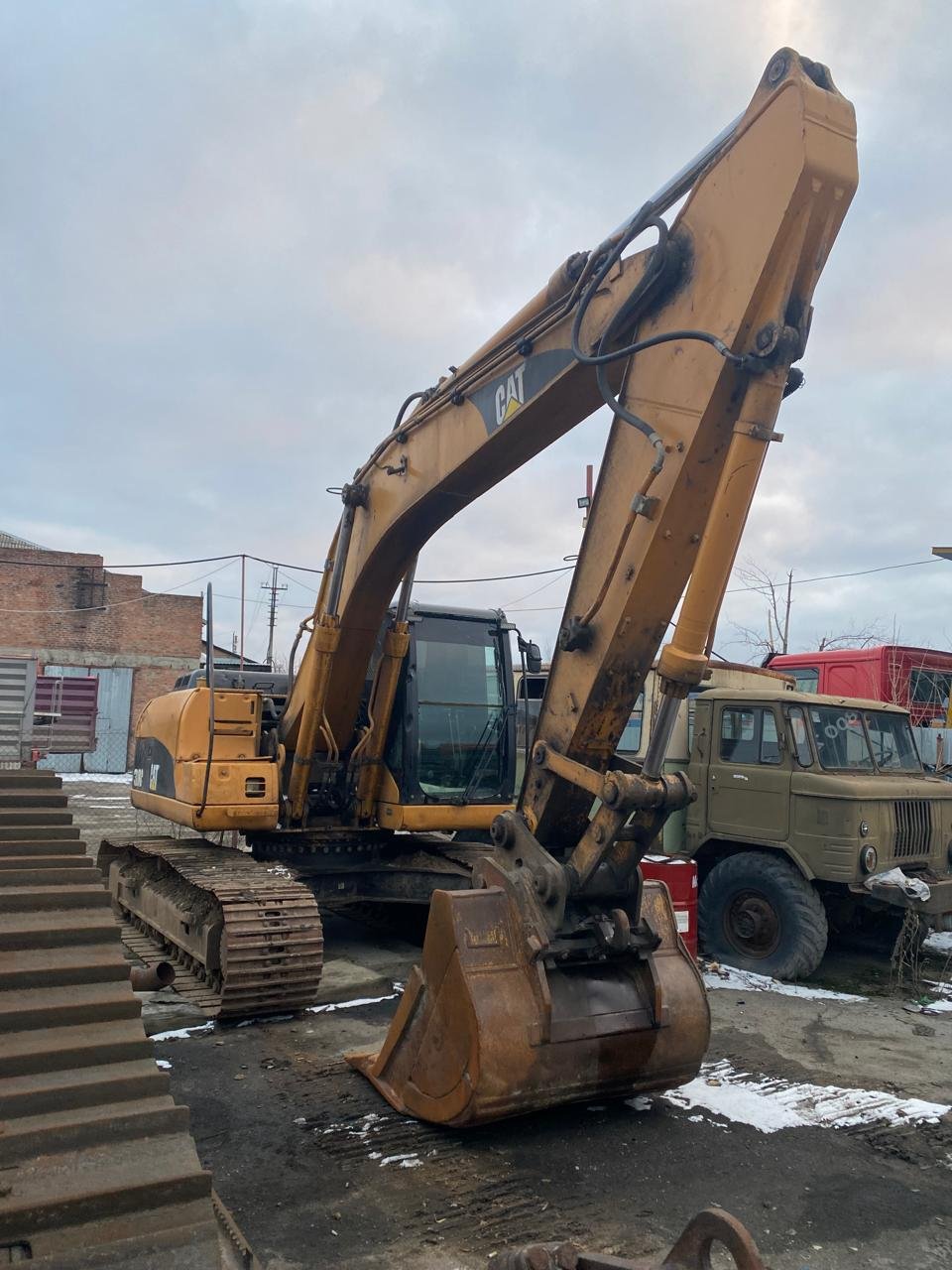 Аренда экскаватора CAT 318