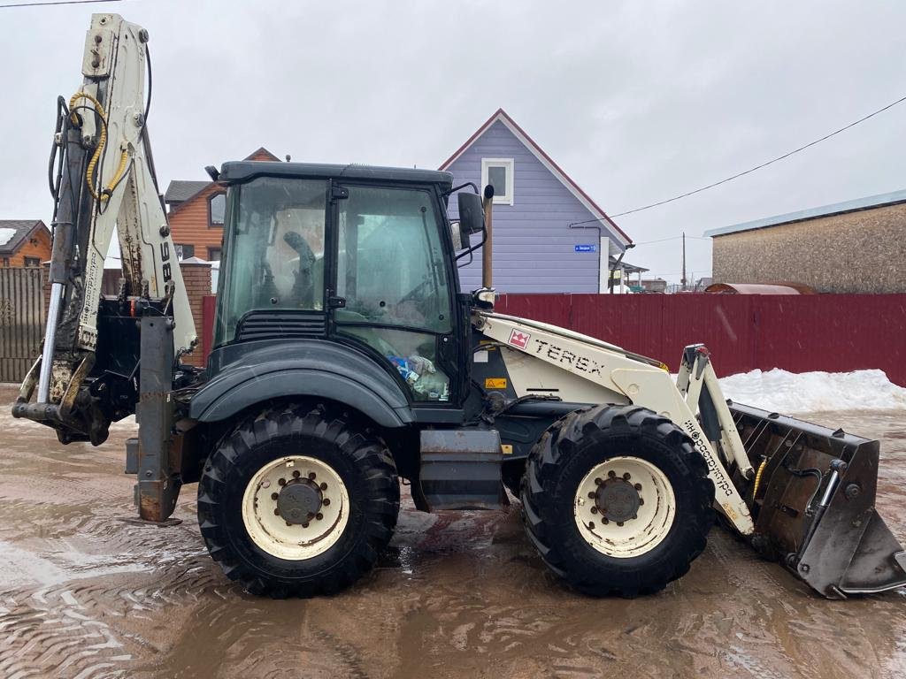Экскаватор погрузчик TEREX 980. Аренда