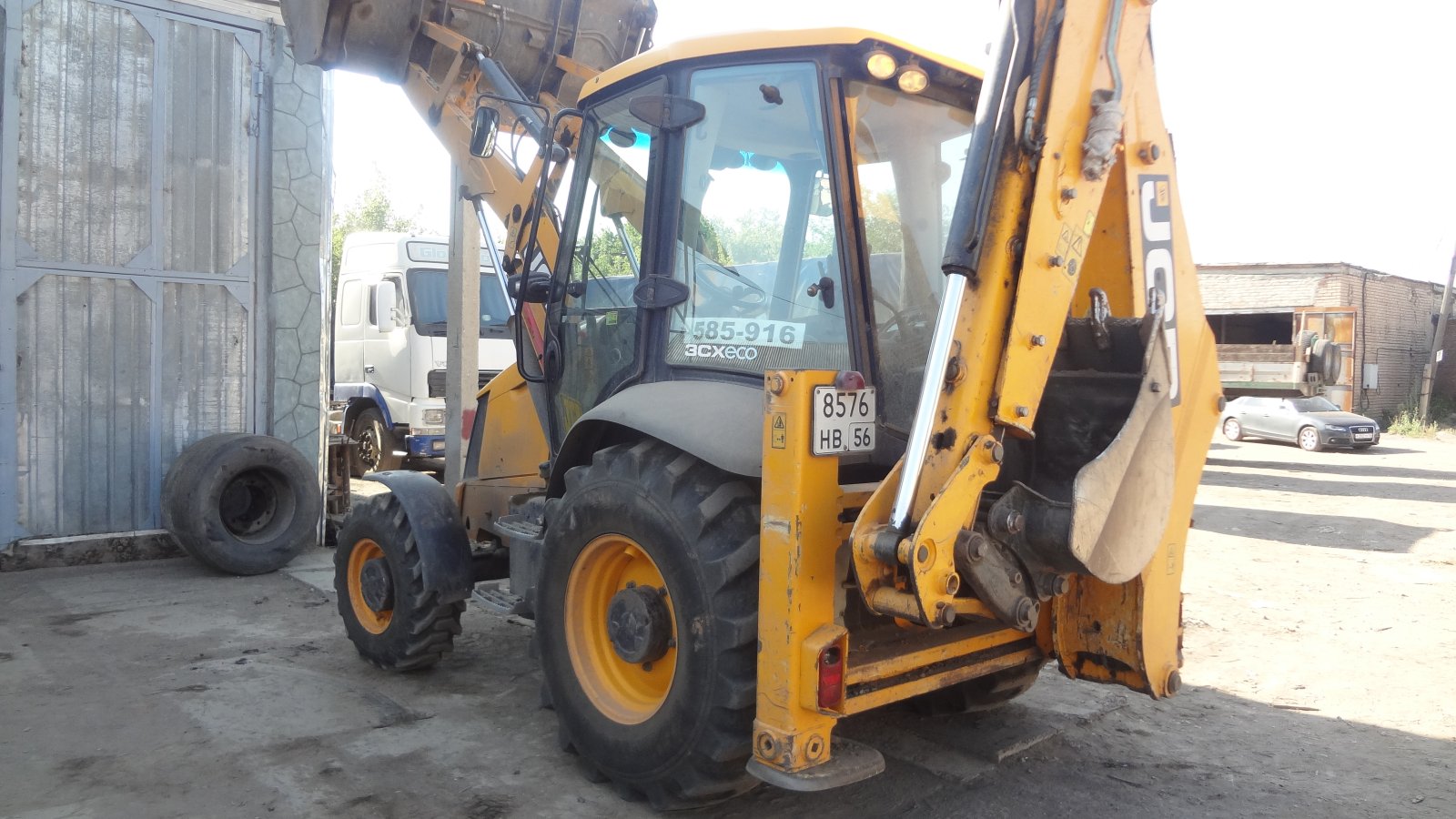 Услуги по чистке снега экскаватор- погрузчик