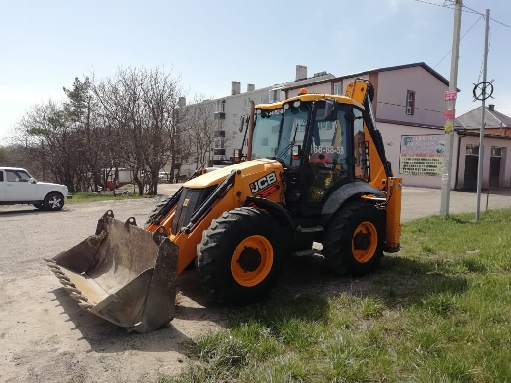 Услуги экскаватора погрузчика