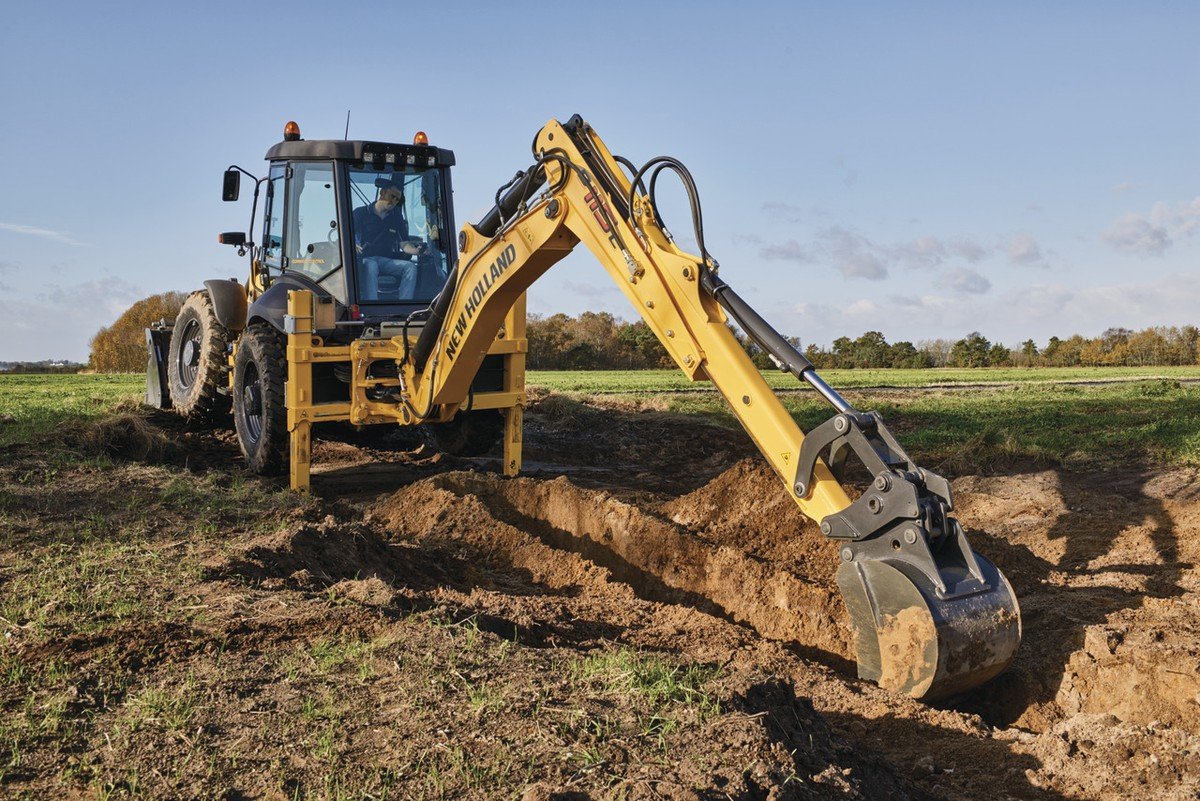 Аренда экскaвaтopа погрузчикa NEW HOLLAND 115