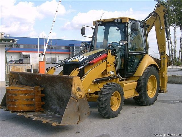 Аренда экскаватора-погрузчика Caterpillar428E*